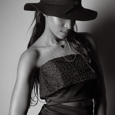 Black-and-white fashion portrait.